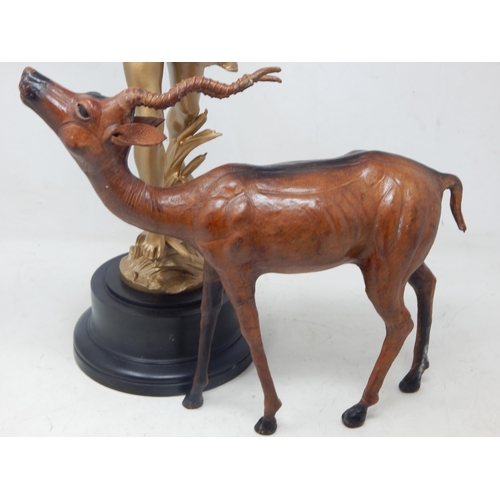 343 - Liberty Style Leather Antelope 32cm wide together with a gilded large spelter figure 45cm high