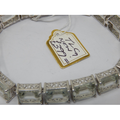 197 - Sterling Silver Bracelet with Gem Set Links: Length 19cm: Attached £399 Price Tag