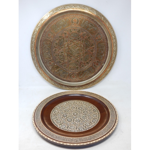 307 - Islamic Mixed Metals Wall Charger 49.5cm diameter together with a further charger inlaid with mother... 