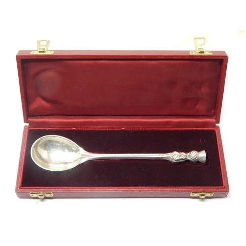 215 - OMAR RAMSDEN: Silver Spoon with Thistle Terminal Hallmarked London 1938 in Fitted Case: Length 16cm:... 