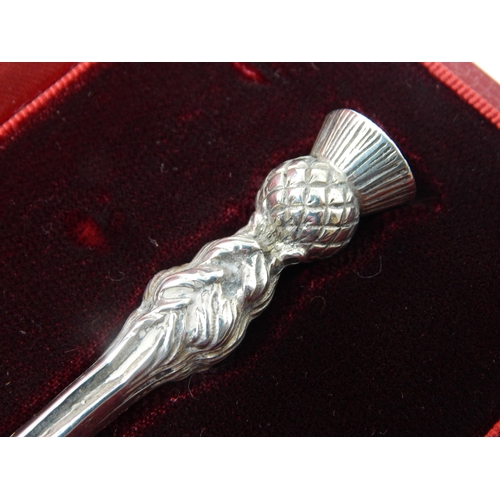 215 - OMAR RAMSDEN: Silver Spoon with Thistle Terminal Hallmarked London 1938 in Fitted Case: Length 16cm:... 