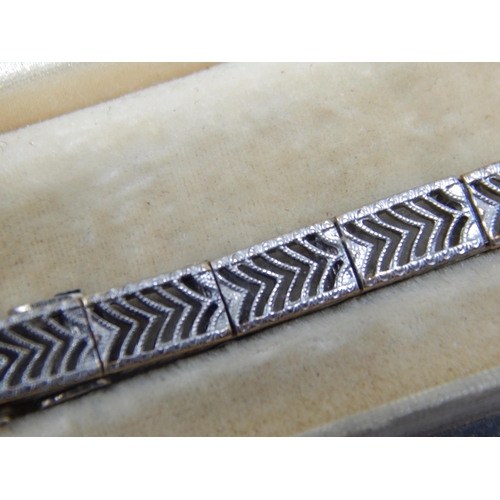 228 - Art Deco 14ct White Gold Bracelet Set with 3 Good Sapphires: 17cm long: in original Marcus & Co, 5th... 