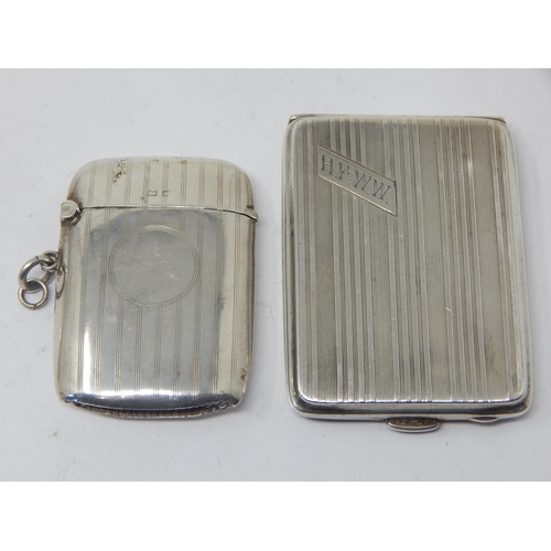 270 - Silver Vesta Case Hallmarked Birmingham 1923 by Rollaston Brothers together with a Silver Match Safe... 