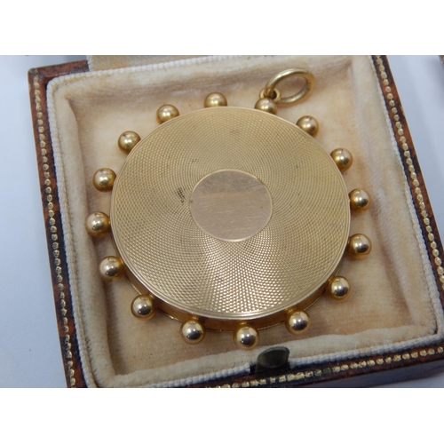 275B - 9ct Gold Open Face Photo Locket Pendant 13.3g gross together with a large Victorian yellow metal gem... 