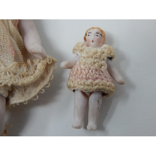 400I - Antique Miniature Bisque Dolls in Original Costumes: Smallest 3cm - Largest 7.5cm