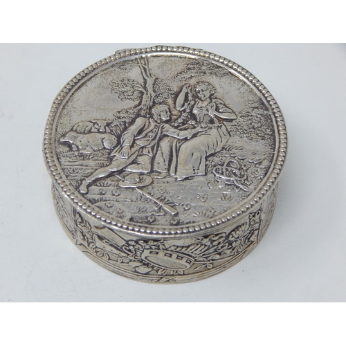 275L - 19th Century Continental Silver Snuff Box, The Hinged Top with Figural Decoration: Measures 6cm Diam... 