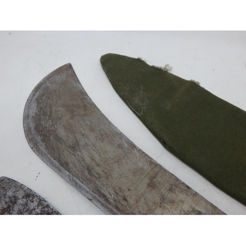 465 - Large Machete & Scabbard 54.5cm together with a Kukri, 42cm