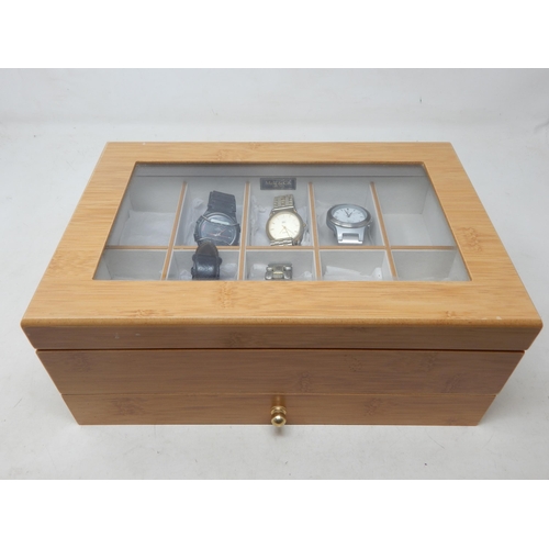 404 - A Group of Wristwatches contained in a Glass Top Wooden Watch Display Case with Lower Drawer