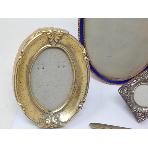 123 - Quantity of Photograph Frames Including a small silver double frame, a pair of guilloche enamel fram... 