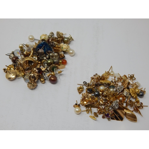 208 - A Quantity of 9ct Gold Earrings (gross 24.6g) together with a quantity of unmarked yellow metal earr... 