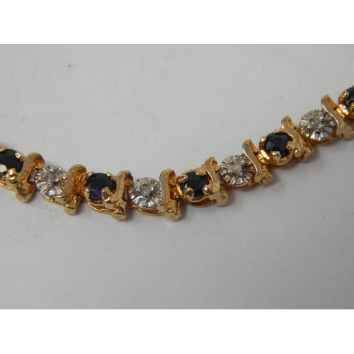 215 - 9ct Gold Gem Set Tennis Bracelet: Length 18cm: Weight 6.72g