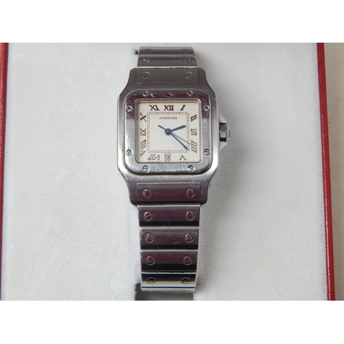 299 - Cartier: A Gentleman's Stainless Steel Calendar Centre Seconds Wristwatch, signed Cartier, model: Sa... 