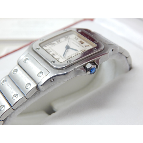 299 - Cartier: A Gentleman's Stainless Steel Calendar Centre Seconds Wristwatch, signed Cartier, model: Sa... 