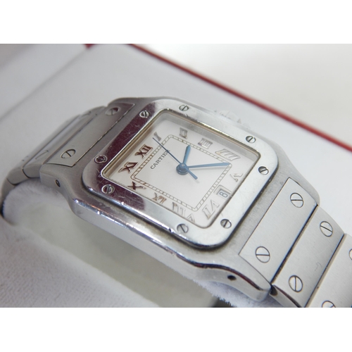 299 - Cartier: A Gentleman's Stainless Steel Calendar Centre Seconds Wristwatch, signed Cartier, model: Sa... 