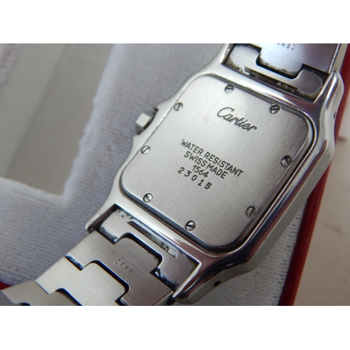 299 - Cartier: A Gentleman's Stainless Steel Calendar Centre Seconds Wristwatch, signed Cartier, model: Sa... 