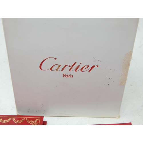 299 - Cartier: A Gentleman's Stainless Steel Calendar Centre Seconds Wristwatch, signed Cartier, model: Sa... 