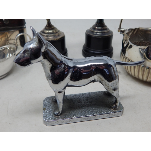 130 - An Art Deco Chrome Car Mascot Modelled as a Hound together with a quantity of silver plated wares.