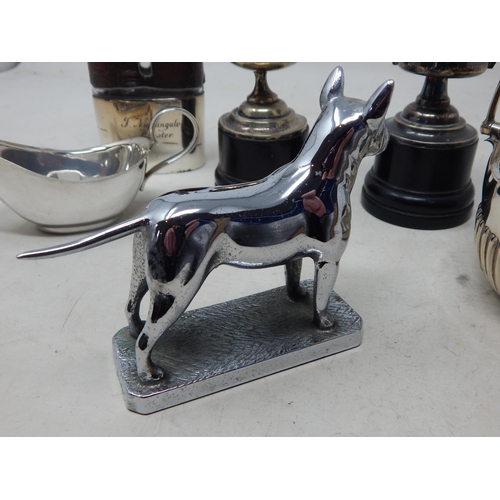 130 - An Art Deco Chrome Car Mascot Modelled as a Hound together with a quantity of silver plated wares.