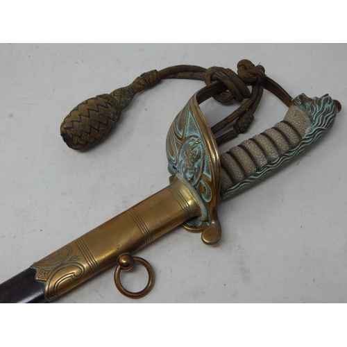 British naval officers dress sword, the blade etched with royal cypher and anchor, brass hilt with folding side guard, shagreen grip, bullion dress knot in brass mounted leather scabbard & black outer cover