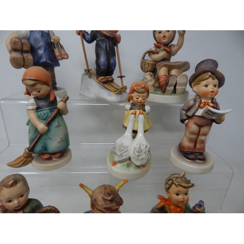 471 - A Quantity of Hummel Figures (9) together with a Hummel collectors guide and a set of Hummel place m... 