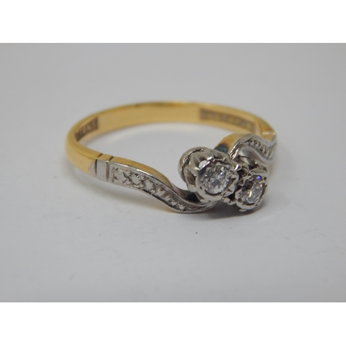 235 - 18ct Gold Diamond Crossover Ring: Size H: Gross weight 2.46g