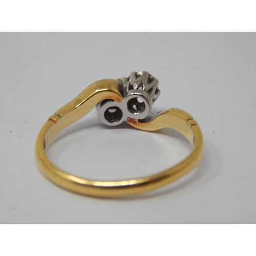 235 - 18ct Gold Diamond Crossover Ring: Size H: Gross weight 2.46g