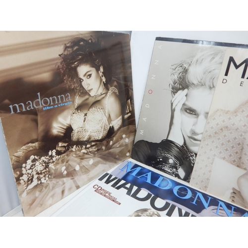 393 - A Quantity of Madonna Vinyl L.P's & Singles together with Book 