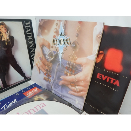 393 - A Quantity of Madonna Vinyl L.P's & Singles together with Book 