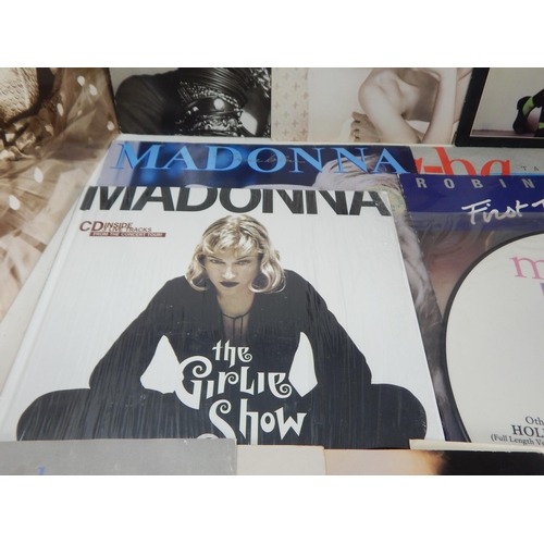 393 - A Quantity of Madonna Vinyl L.P's & Singles together with Book 