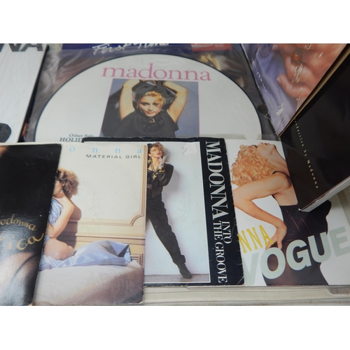 393 - A Quantity of Madonna Vinyl L.P's & Singles together with Book 