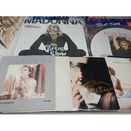 393 - A Quantity of Madonna Vinyl L.P's & Singles together with Book 