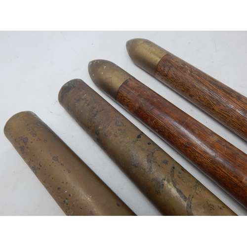 478 - WWII: A Pair of Brass Shell Cases 1939 measuring 30cm together with a Pair of Brass & Wooden Trainin... 