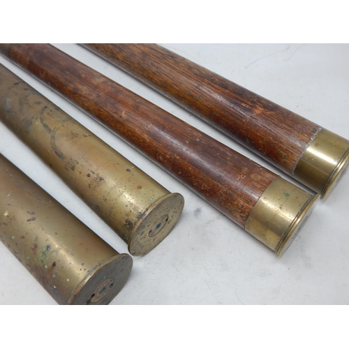 478 - WWII: A Pair of Brass Shell Cases 1939 measuring 30cm together with a Pair of Brass & Wooden Trainin... 