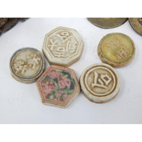 77 - Ancient Chinese Cash Coins together with 19th Century Chinese porcelain gambling tokens, signed with... 