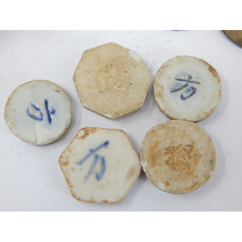 77 - Ancient Chinese Cash Coins together with 19th Century Chinese porcelain gambling tokens, signed with... 