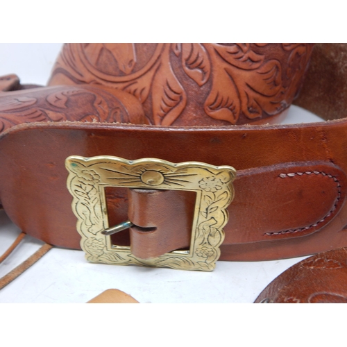 390 - Tan Leather Cowboy Belt with Brass Buckle & Gun Holster together with a pair of spurs, a tramontina ... 