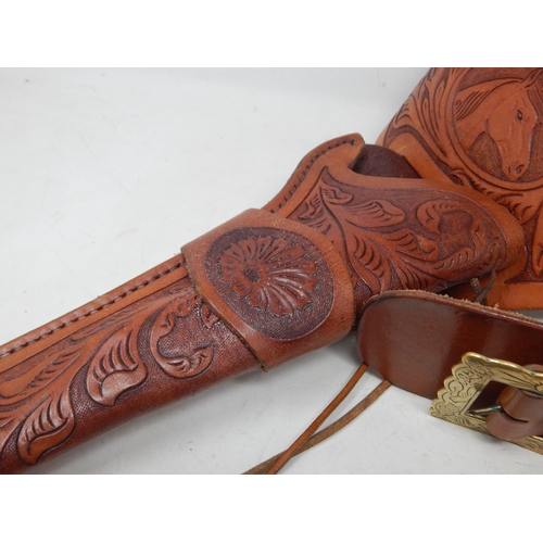 390 - Tan Leather Cowboy Belt with Brass Buckle & Gun Holster together with a pair of spurs, a tramontina ... 