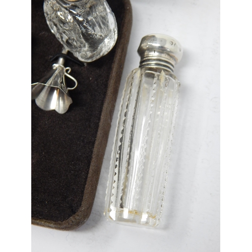 144 - Victorian Silver Topped Perfume Bottle together with a further silver perfume topped bottle with ins... 