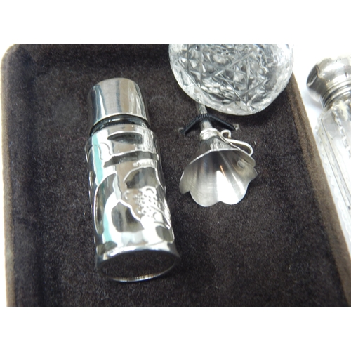 144 - Victorian Silver Topped Perfume Bottle together with a further silver perfume topped bottle with ins... 