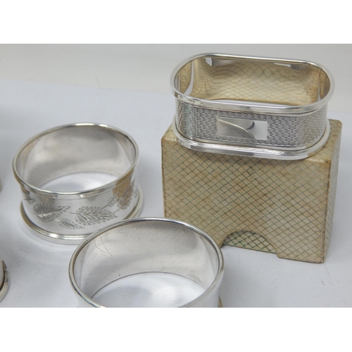 146 - A Quantity of Hallmarked Silver Napkin Rings, All with blank cartouches: Various Dates & Makers (7)