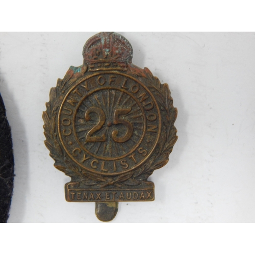 357 - WWI Cyclists Battalion Badges together with a Blazer Badge