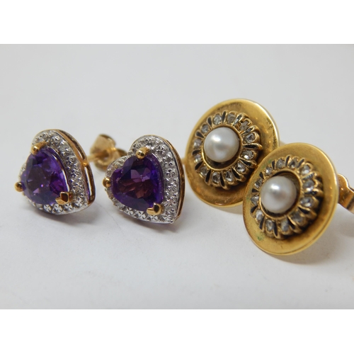 223 - A Pair of Gold Diamond & Amethyst Heart Shaped Earrings together with a pair of gold, diamond & pear... 