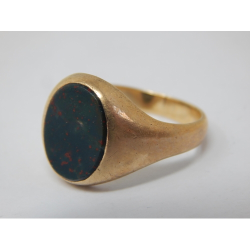 248 - 9ct Gold Signet Ring Inset with a Bloodstone: Size R: Gross weight 7.5g