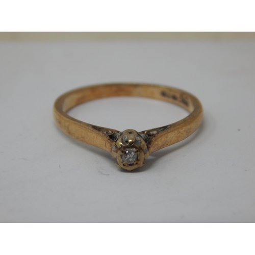 252 - 9ct Gold Diamond Solitaire Ring: Size K/L: Gross weight 1.76g