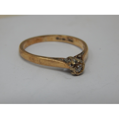 252 - 9ct Gold Diamond Solitaire Ring: Size K/L: Gross weight 1.76g