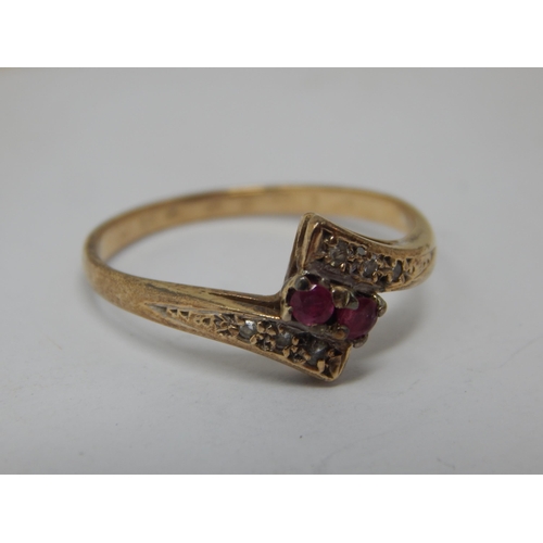 253 - 9ct Gold Diamond & Ruby Set Ring: Size P/Q: Gross weight 2.17g