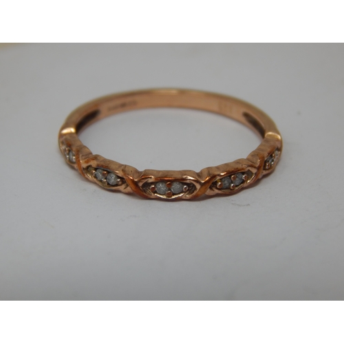 254 - 9ct Gold Diamond Set Ring: Size P: Gross weight 1.58g