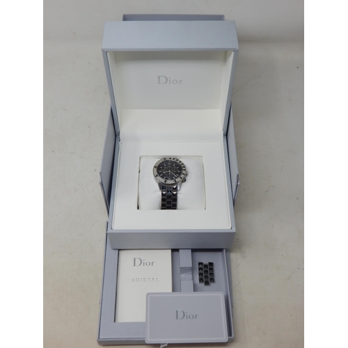 306 - Dior: A Christian Dior Christal diamond set bracelet watch, the black chronograph dial set with 14 r... 