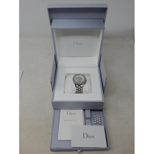 307 - Dior: A Christian Dior Christal diamond set bracelet watch, the white chronograph dial set with 14 r... 