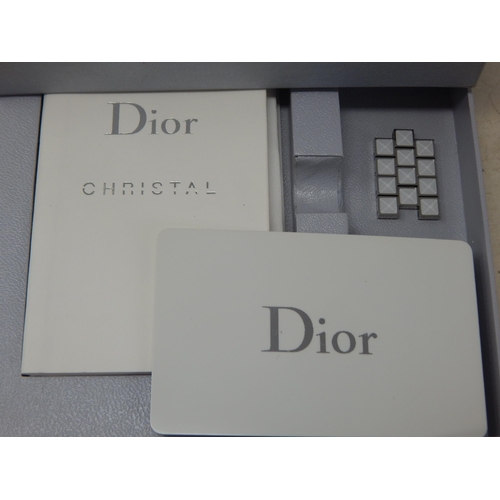 307 - Dior: A Christian Dior Christal diamond set bracelet watch, the white chronograph dial set with 14 r... 